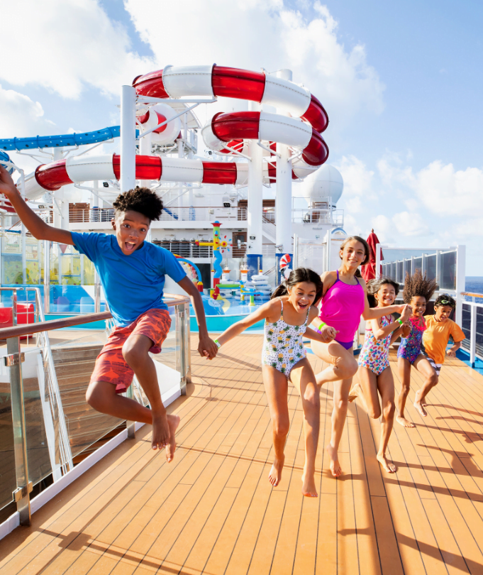 A happy family playing on the deck of a Carnival Cruise.