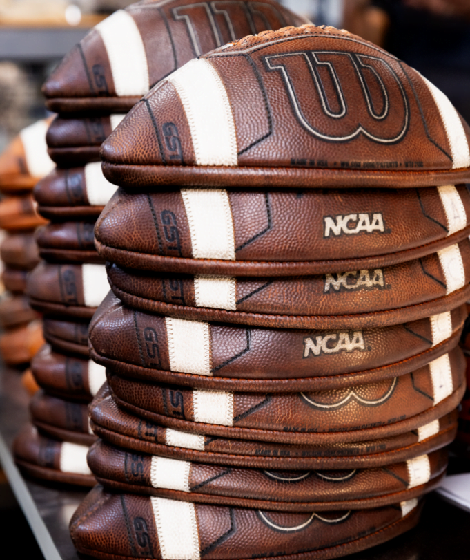 A stack of Willson footballs.